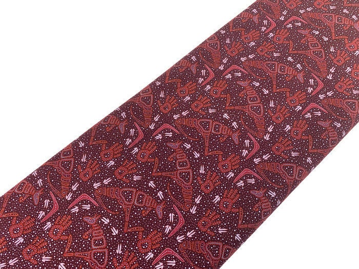 Australian Aboriginal Cotton Quilting Fabric by the YARD. M&S Textiles Rock Art Dreaming Burgundy. Original Aboriginal Kangaroo Art Design.