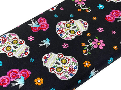 Day of the Dead Sugar Skull Fabric with Silver Metallic Glitter. Halloween Fabric Sold by the YARD. 100% Cotton for apparel & home decor.